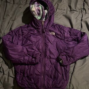 The North Face Kids reversible  Purple and plaid Puffer Jacket. Size 10-12. Exc
